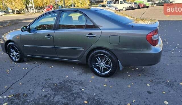 Серый Тойота Камри, объемом двигателя 3 л и пробегом 210 тыс. км за 4800 $, фото 11 на Automoto.ua