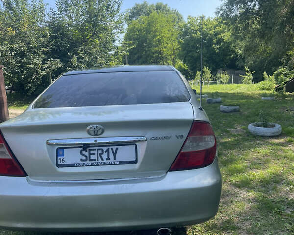 Серый Тойота Камри, объемом двигателя 3 л и пробегом 310 тыс. км за 4200 $, фото 3 на Automoto.ua