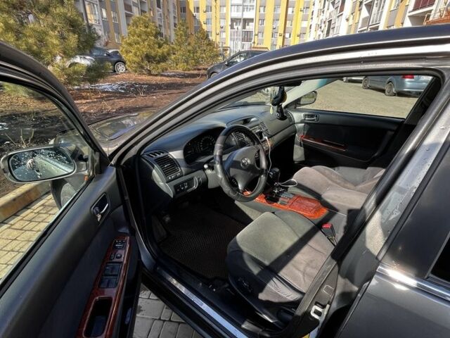 Серый Тойота Камри, объемом двигателя 2.4 л и пробегом 346 тыс. км за 5100 $, фото 6 на Automoto.ua