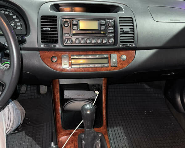 Серый Тойота Камри, объемом двигателя 2.4 л и пробегом 101 тыс. км за 7500 $, фото 11 на Automoto.ua