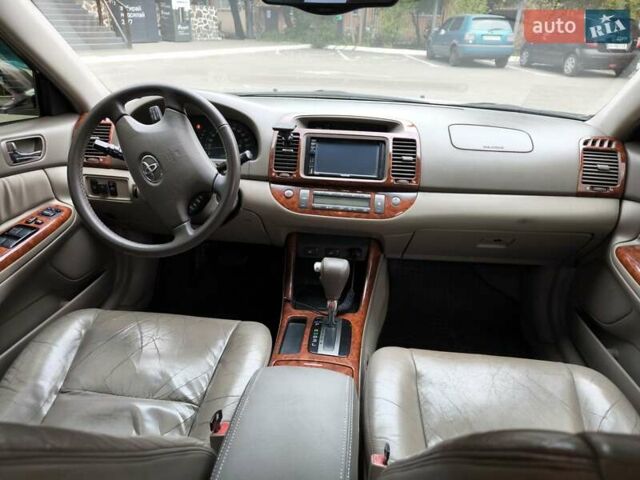 Сірий Тойота Камрі, об'ємом двигуна 3 л та пробігом 284 тис. км за 5700 $, фото 19 на Automoto.ua