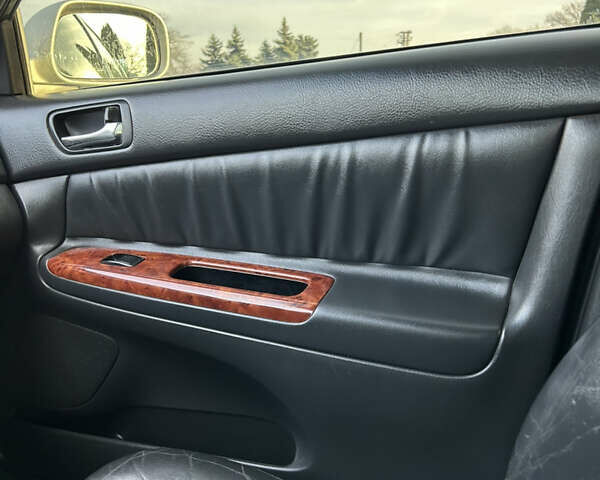 Серый Тойота Камри, объемом двигателя 3 л и пробегом 255 тыс. км за 6800 $, фото 14 на Automoto.ua