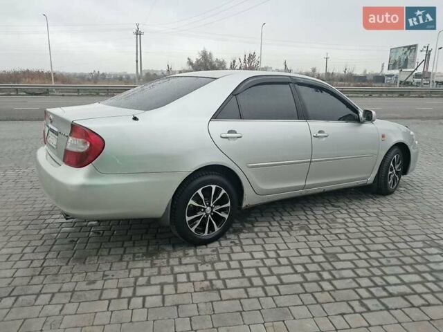 Серый Тойота Камри, объемом двигателя 2.4 л и пробегом 365 тыс. км за 5700 $, фото 6 на Automoto.ua