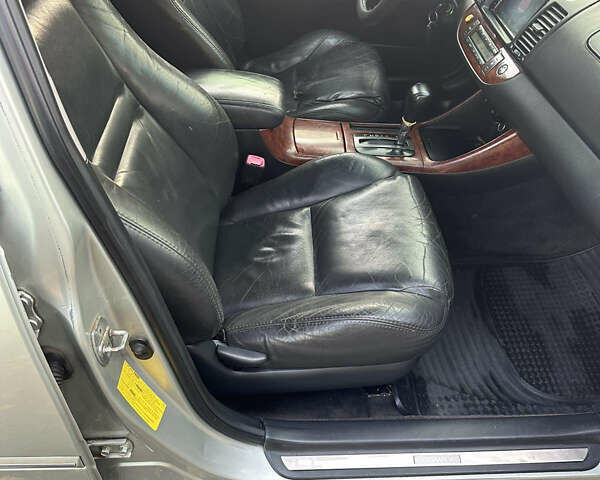 Сірий Тойота Камрі, об'ємом двигуна 2.36 л та пробігом 380 тис. км за 4500 $, фото 6 на Automoto.ua