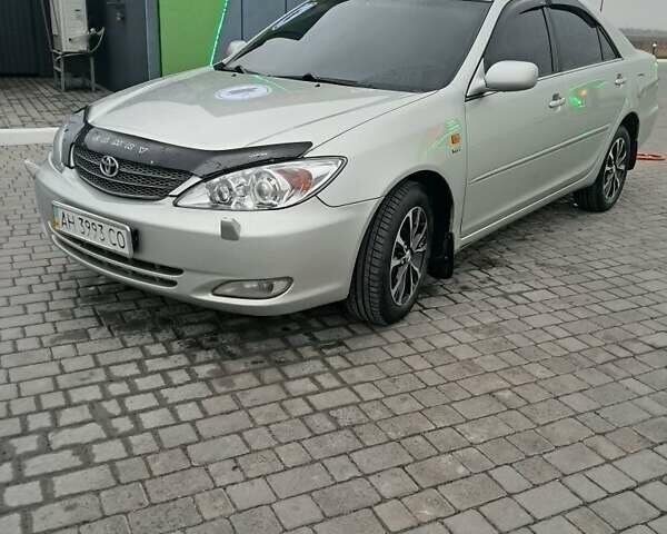 Серый Тойота Камри, объемом двигателя 2.4 л и пробегом 365 тыс. км за 5700 $, фото 1 на Automoto.ua