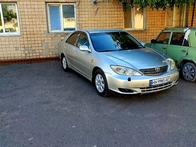 Сірий Тойота Камрі, об'ємом двигуна 2.4 л та пробігом 260 тис. км за 5500 $, фото 4 на Automoto.ua