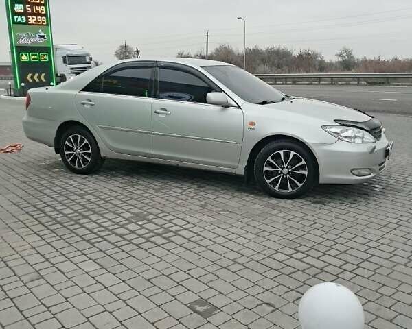 Серый Тойота Камри, объемом двигателя 2.4 л и пробегом 365 тыс. км за 5700 $, фото 5 на Automoto.ua