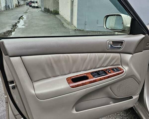 Серый Тойота Камри, объемом двигателя 3 л и пробегом 330 тыс. км за 3000 $, фото 13 на Automoto.ua