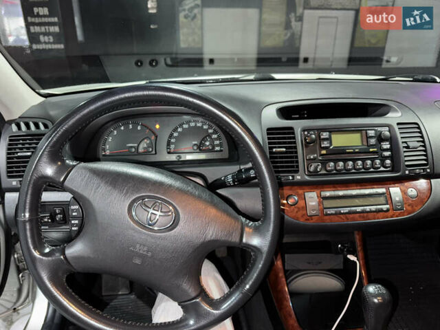 Серый Тойота Камри, объемом двигателя 2.4 л и пробегом 101 тыс. км за 7500 $, фото 7 на Automoto.ua