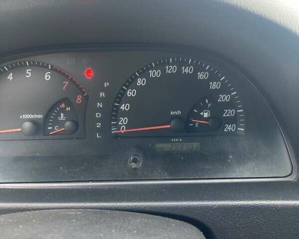 Сірий Тойота Камрі, об'ємом двигуна 2.4 л та пробігом 300 тис. км за 5400 $, фото 5 на Automoto.ua