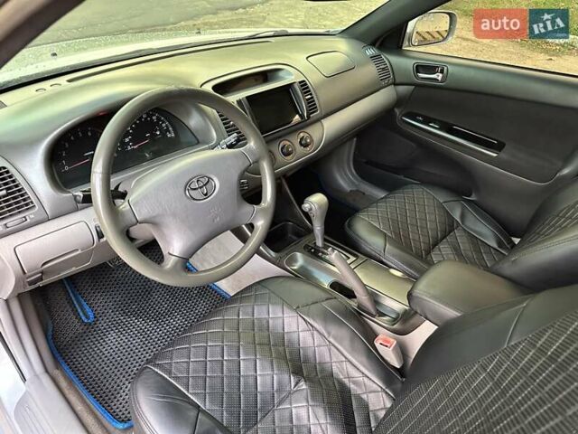 Серый Тойота Камри, объемом двигателя 2.36 л и пробегом 300 тыс. км за 5200 $, фото 18 на Automoto.ua