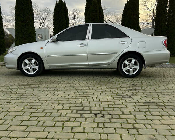 Серый Тойота Камри, объемом двигателя 3 л и пробегом 255 тыс. км за 6800 $, фото 28 на Automoto.ua