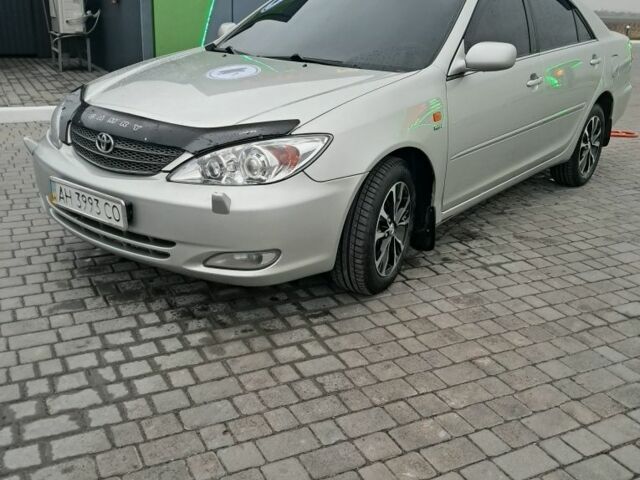 Серый Тойота Камри, объемом двигателя 2.4 л и пробегом 365 тыс. км за 5700 $, фото 2 на Automoto.ua