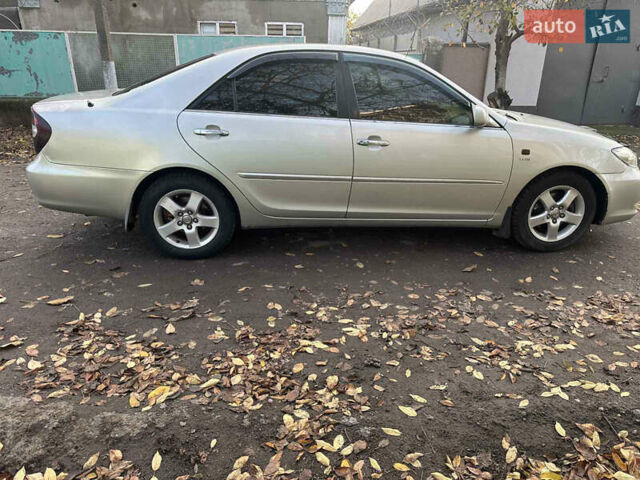 Сірий Тойота Камрі, об'ємом двигуна 2.36 л та пробігом 380 тис. км за 4500 $, фото 3 на Automoto.ua