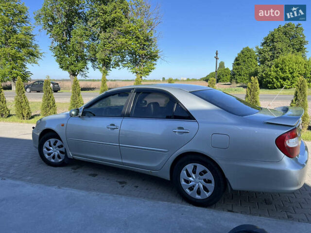 Серый Тойота Камри, объемом двигателя 3 л и пробегом 217 тыс. км за 5700 $, фото 1 на Automoto.ua