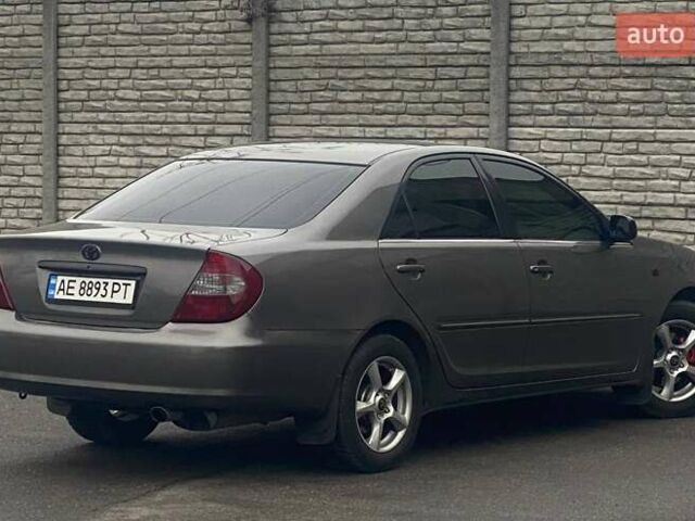 Серый Тойота Камри, объемом двигателя 2.4 л и пробегом 270 тыс. км за 5600 $, фото 5 на Automoto.ua