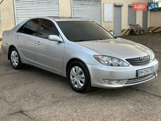 Серый Тойота Камри, объемом двигателя 2.36 л и пробегом 300 тыс. км за 5200 $, фото 9 на Automoto.ua