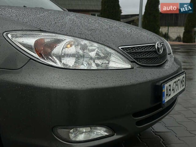 Серый Тойота Камри, объемом двигателя 2.36 л и пробегом 617 тыс. км за 5700 $, фото 8 на Automoto.ua