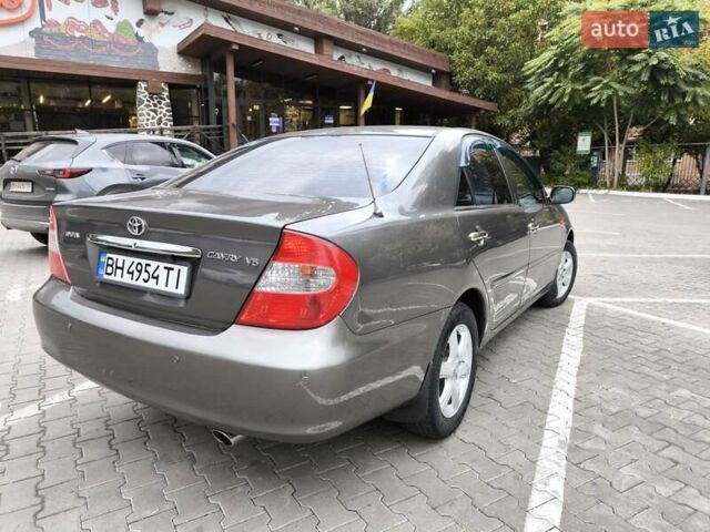 Сірий Тойота Камрі, об'ємом двигуна 3 л та пробігом 284 тис. км за 5700 $, фото 7 на Automoto.ua