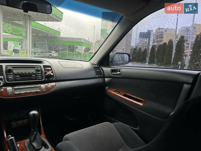 Серый Тойота Камри, объемом двигателя 2.36 л и пробегом 617 тыс. км за 5700 $, фото 20 на Automoto.ua