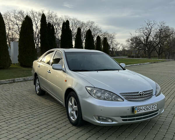 Серый Тойота Камри, объемом двигателя 3 л и пробегом 255 тыс. км за 6800 $, фото 2 на Automoto.ua