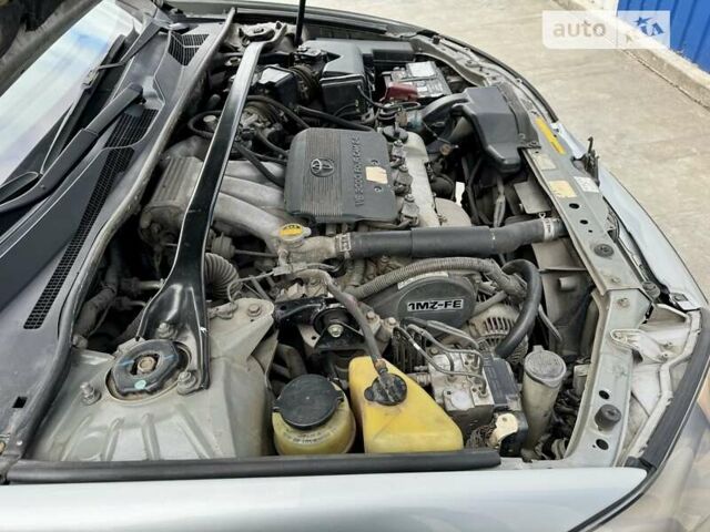 Сірий Тойота Камрі, об'ємом двигуна 3 л та пробігом 223 тис. км за 5999 $, фото 21 на Automoto.ua