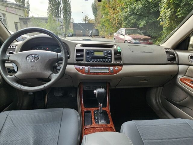 Серый Тойота Камри, объемом двигателя 3 л и пробегом 200 тыс. км за 3700 $, фото 23 на Automoto.ua