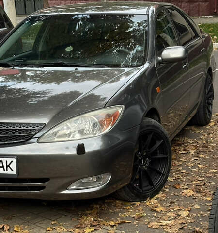 Серый Тойота Камри, объемом двигателя 3 л и пробегом 417 тыс. км за 8000 $, фото 6 на Automoto.ua