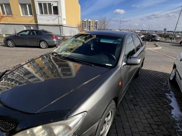 Серый Тойота Камри, объемом двигателя 2.4 л и пробегом 346 тыс. км за 5100 $, фото 3 на Automoto.ua