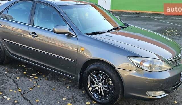 Серый Тойота Камри, объемом двигателя 3 л и пробегом 210 тыс. км за 4800 $, фото 9 на Automoto.ua