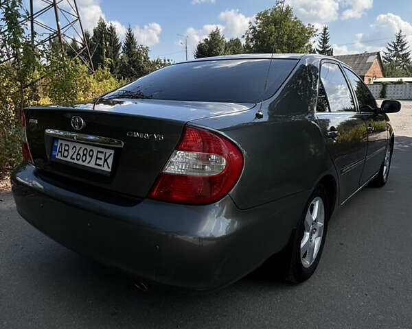 Серый Тойота Камри, объемом двигателя 3 л и пробегом 390 тыс. км за 6200 $, фото 16 на Automoto.ua