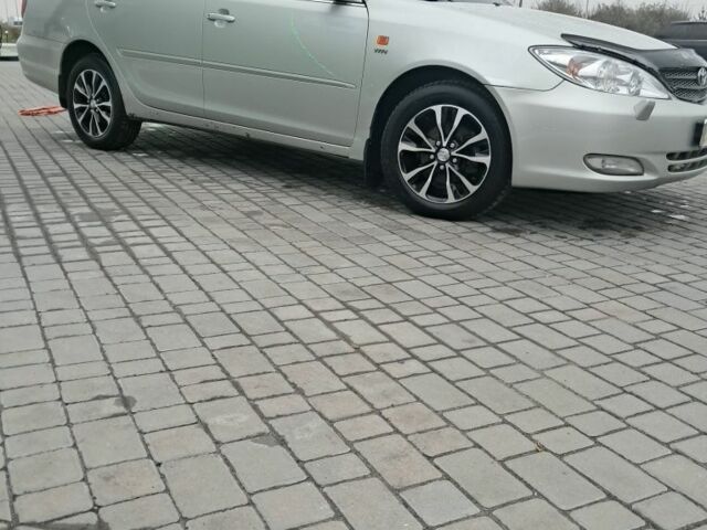 Серый Тойота Камри, объемом двигателя 2.4 л и пробегом 365 тыс. км за 5700 $, фото 5 на Automoto.ua