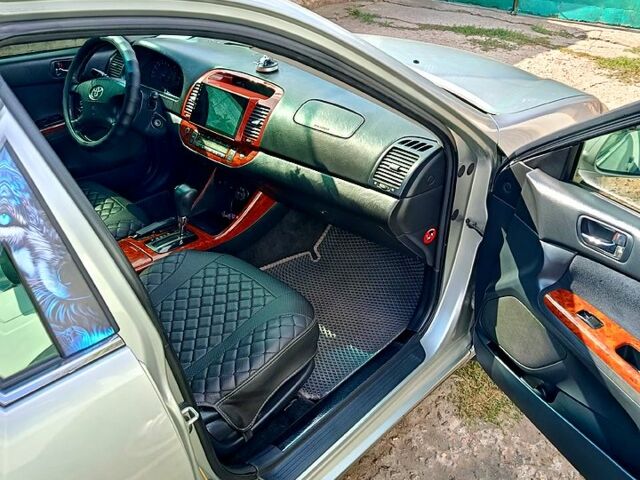 Сірий Тойота Камрі, об'ємом двигуна 2.4 л та пробігом 260 тис. км за 5500 $, фото 11 на Automoto.ua