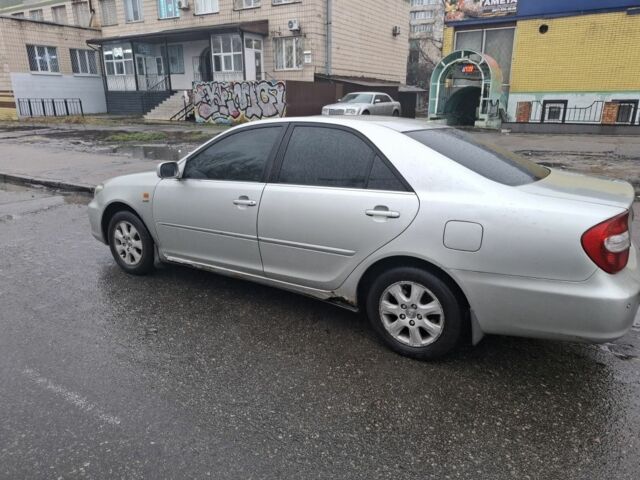 Серый Тойота Камри, объемом двигателя 2 л и пробегом 400 тыс. км за 4200 $, фото 1 на Automoto.ua