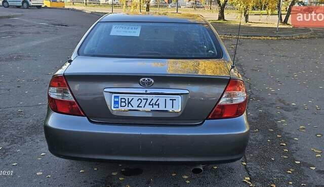 Серый Тойота Камри, объемом двигателя 3 л и пробегом 210 тыс. км за 4800 $, фото 7 на Automoto.ua