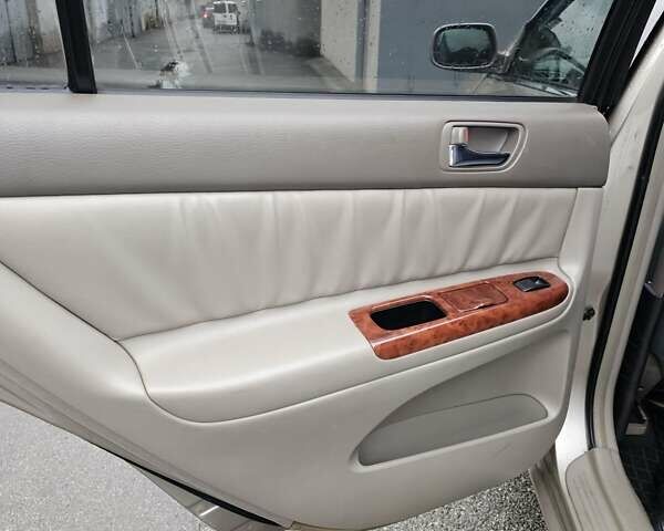 Серый Тойота Камри, объемом двигателя 3 л и пробегом 330 тыс. км за 3100 $, фото 22 на Automoto.ua