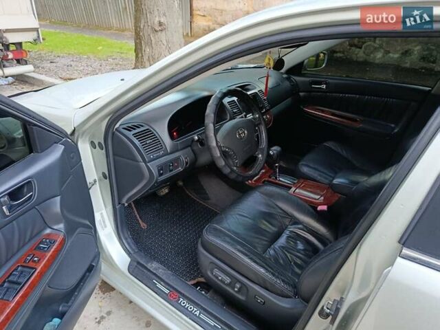 Сірий Тойота Камрі, об'ємом двигуна 3 л та пробігом 210 тис. км за 7200 $, фото 11 на Automoto.ua