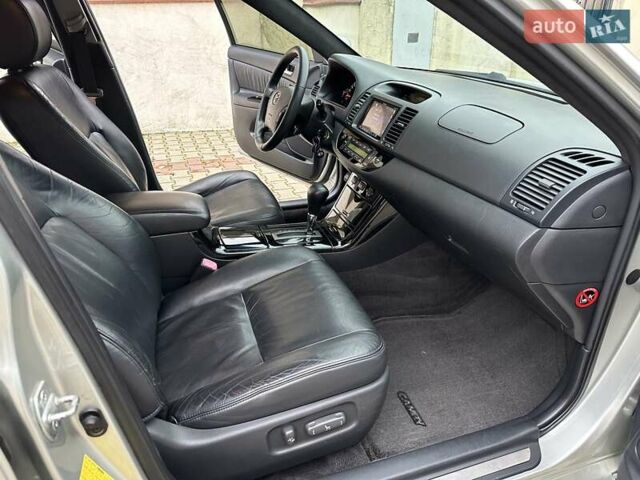 Серый Тойота Камри, объемом двигателя 2.36 л и пробегом 257 тыс. км за 8300 $, фото 58 на Automoto.ua