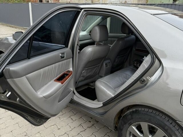 Сірий Тойота Камрі, об'ємом двигуна 3 л та пробігом 361 тис. км за 5500 $, фото 4 на Automoto.ua