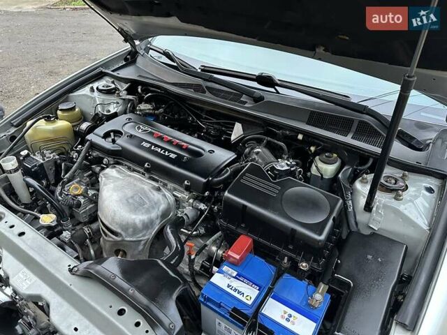 Серый Тойота Камри, объемом двигателя 2.36 л и пробегом 257 тыс. км за 8300 $, фото 70 на Automoto.ua