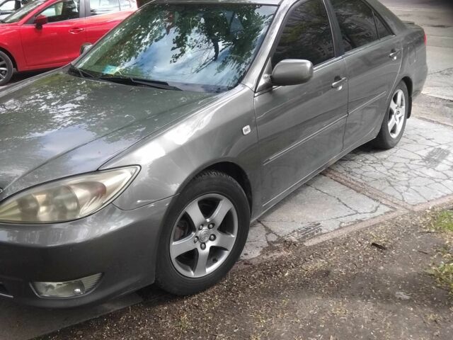 Серый Тойота Камри, объемом двигателя 2.4 л и пробегом 360 тыс. км за 4800 $, фото 2 на Automoto.ua