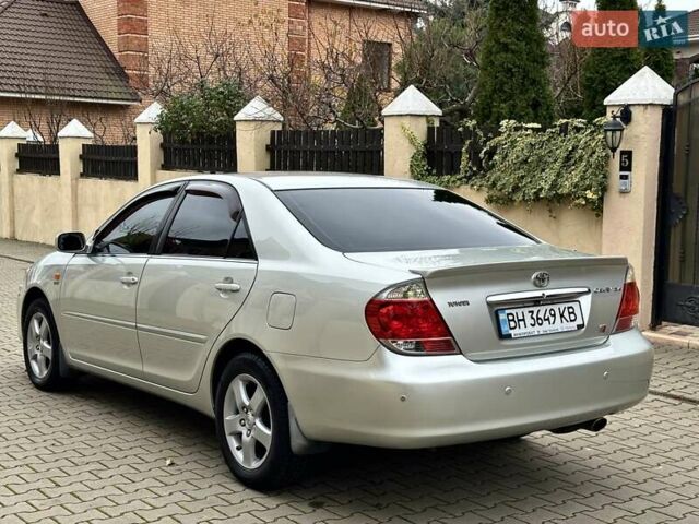 Серый Тойота Камри, объемом двигателя 2.36 л и пробегом 257 тыс. км за 8300 $, фото 43 на Automoto.ua