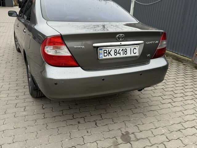 Сірий Тойота Камрі, об'ємом двигуна 3 л та пробігом 361 тис. км за 5500 $, фото 1 на Automoto.ua