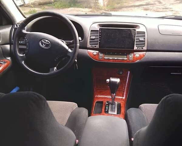 Сірий Тойота Камрі, об'ємом двигуна 2.36 л та пробігом 411 тис. км за 6000 $, фото 12 на Automoto.ua