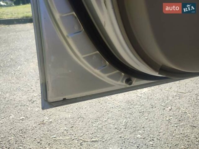 Серый Тойота Камри, объемом двигателя 2.36 л и пробегом 308 тыс. км за 4500 $, фото 4 на Automoto.ua