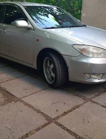 Серый Тойота Камри, объемом двигателя 3 л и пробегом 398 тыс. км за 4900 $, фото 19 на Automoto.ua