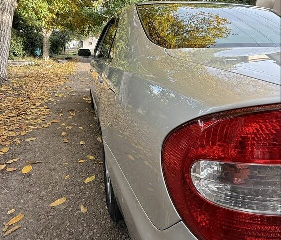 Сірий Тойота Камрі, об'ємом двигуна 3 л та пробігом 242 тис. км за 6200 $, фото 1 на Automoto.ua