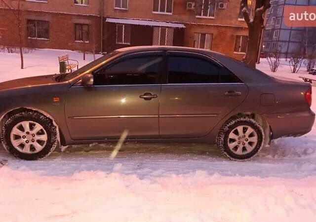 Серый Тойота Камри, объемом двигателя 2.36 л и пробегом 150 тыс. км за 5000 $, фото 1 на Automoto.ua