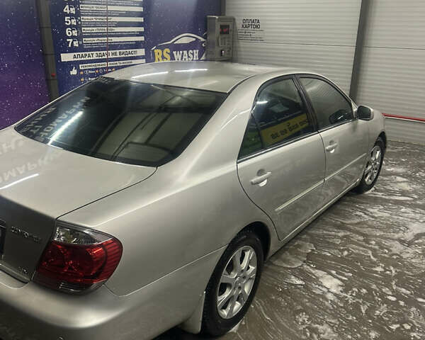 Сірий Тойота Камрі, об'ємом двигуна 3 л та пробігом 242 тис. км за 4300 $, фото 3 на Automoto.ua