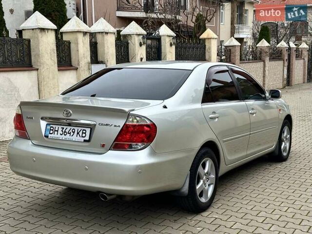 Серый Тойота Камри, объемом двигателя 2.36 л и пробегом 257 тыс. км за 8300 $, фото 32 на Automoto.ua